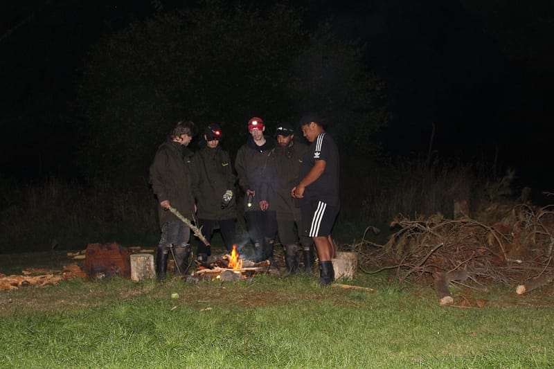 All the boys enjoying each others company around a fire that they have made. (left to right) Josiah Kawana, Sentre Harden, Josh Aitken, Raniera Smyth and Kaloni Taylor.